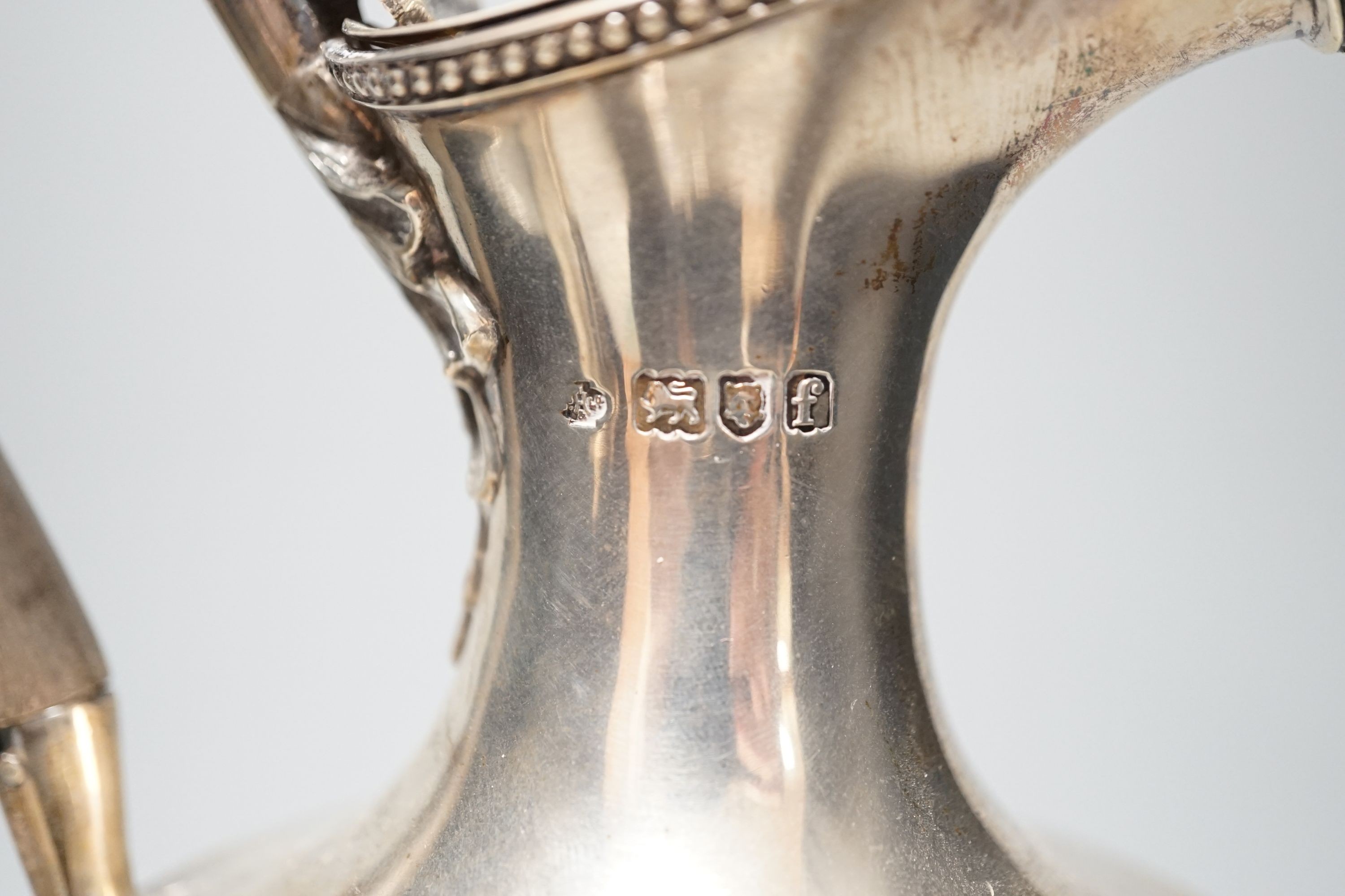 An Edwardian silver hot water jug, by William Hutton & Sons, London, 1901, height 30.7cm, gross weight 18.5oz.